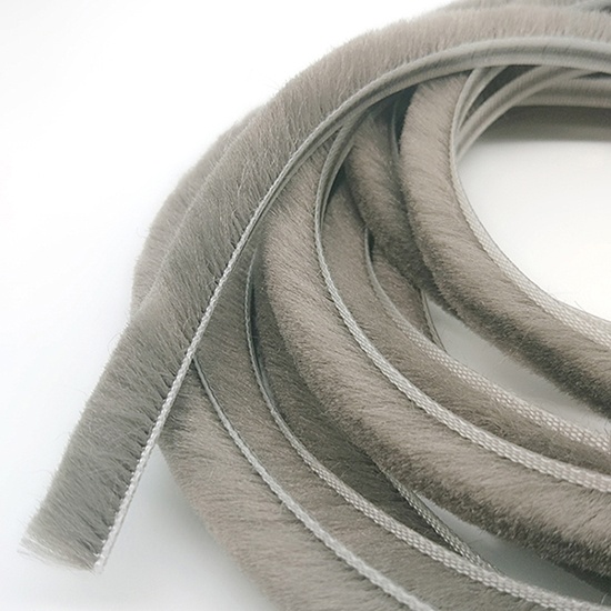 Wool pile weather strip