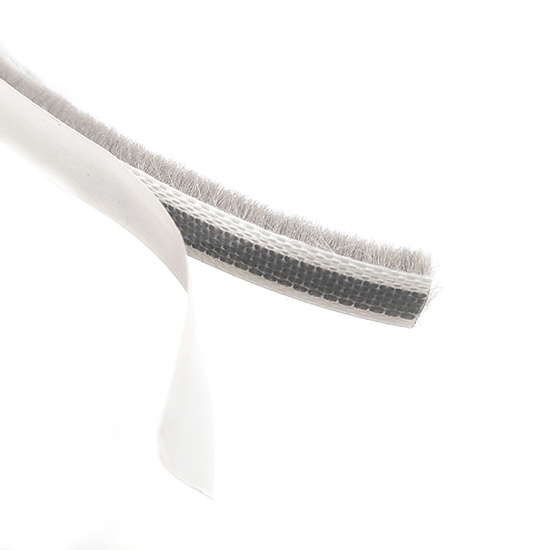 Adhesive wool pile weather stripping for door and windows